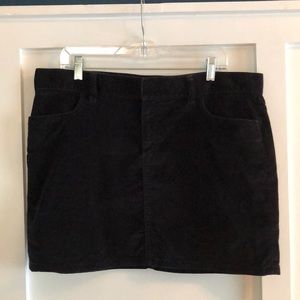 Black velvet mini skirt